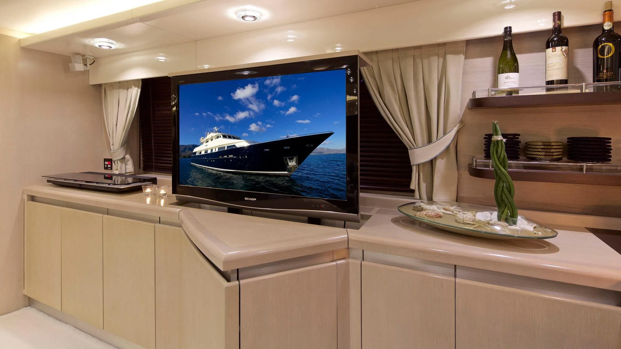 a tv on a counter aboard MAGIX Yacht for Sale