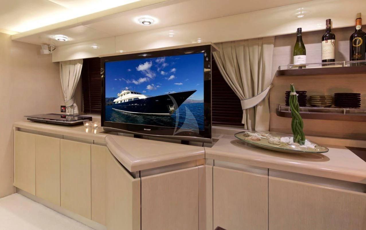 a tv on a counter aboard MAGIX Yacht for Sale