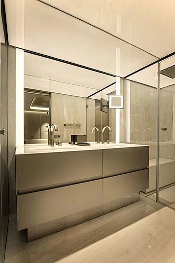 a bathroom with a large mirror aboard VIKTORIIA Yacht for Sale