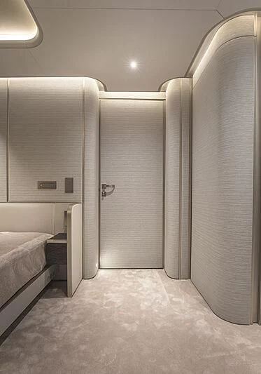 a room with a bed and a closet aboard VIKTORIIA Yacht for Sale