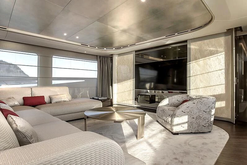 a living room with a fireplace aboard VIKTORIIA Yacht for Sale