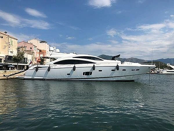 a boat docked at a pier aboard SANDY II Yacht for Sale