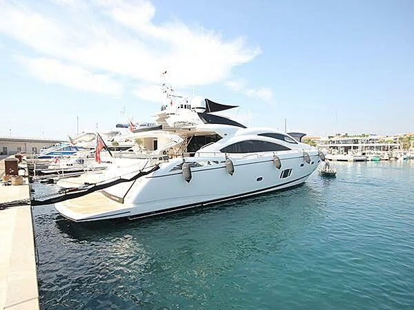 a boat docked at a pier aboard SANDY II Yacht for Sale