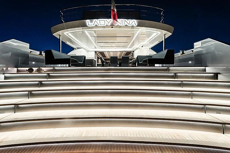 a white building with a flag on top aboard LADY NINA Yacht for Sale
