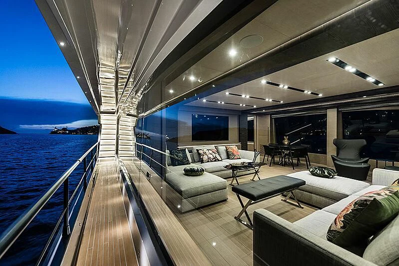 a large living room with a large balcony overlooking the ocean aboard LADY NINA Yacht for Sale