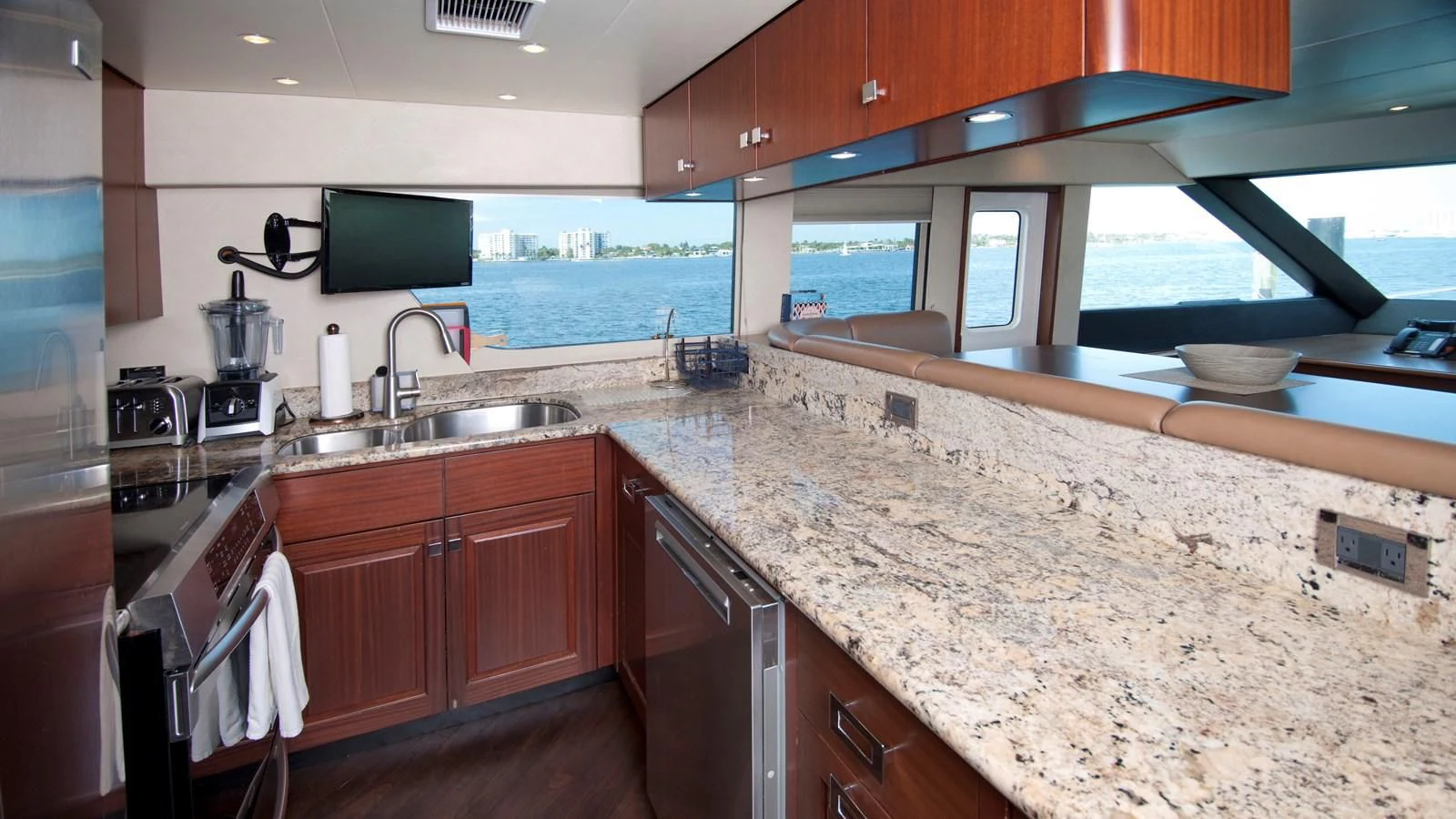 a kitchen with granite counter tops aboard MONCRII Yacht for Sale