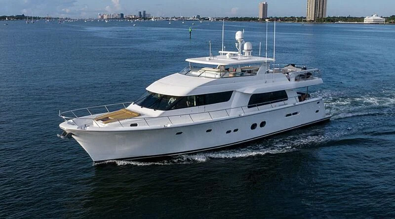 a white yacht on the water aboard MONCRII Yacht for Sale