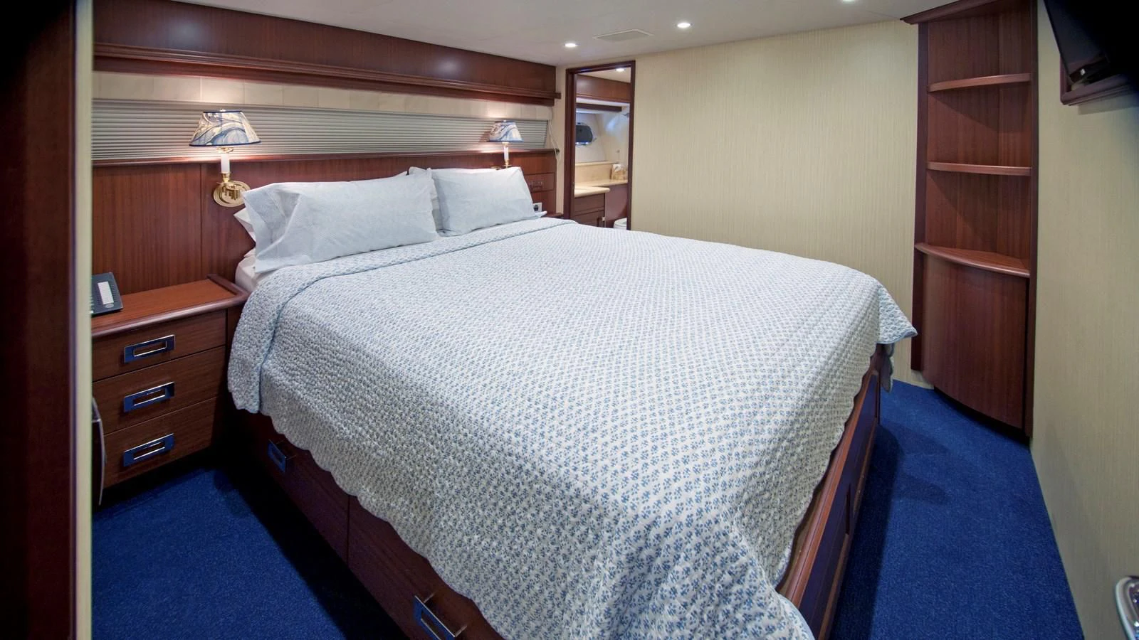 a bed with a white sheet aboard MONCRII Yacht for Sale