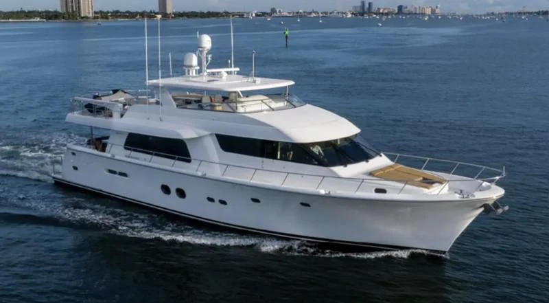 a white yacht on the water aboard MONCRII Yacht for Sale