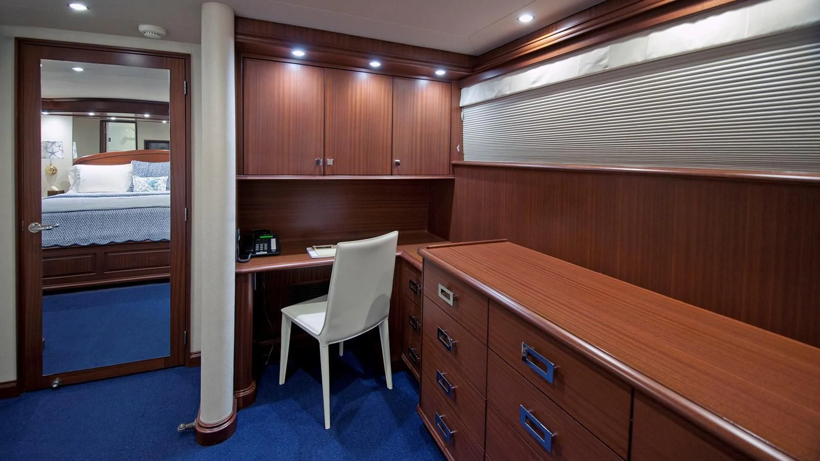 a room with a chair and a desk aboard MONCRII Yacht for Sale