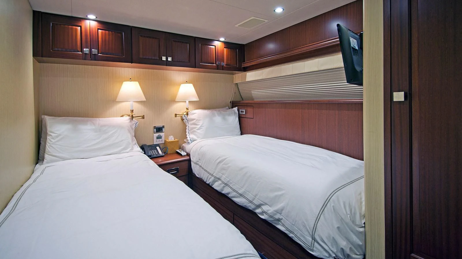 a couple of beds in a hotel room aboard MONCRII Yacht for Sale