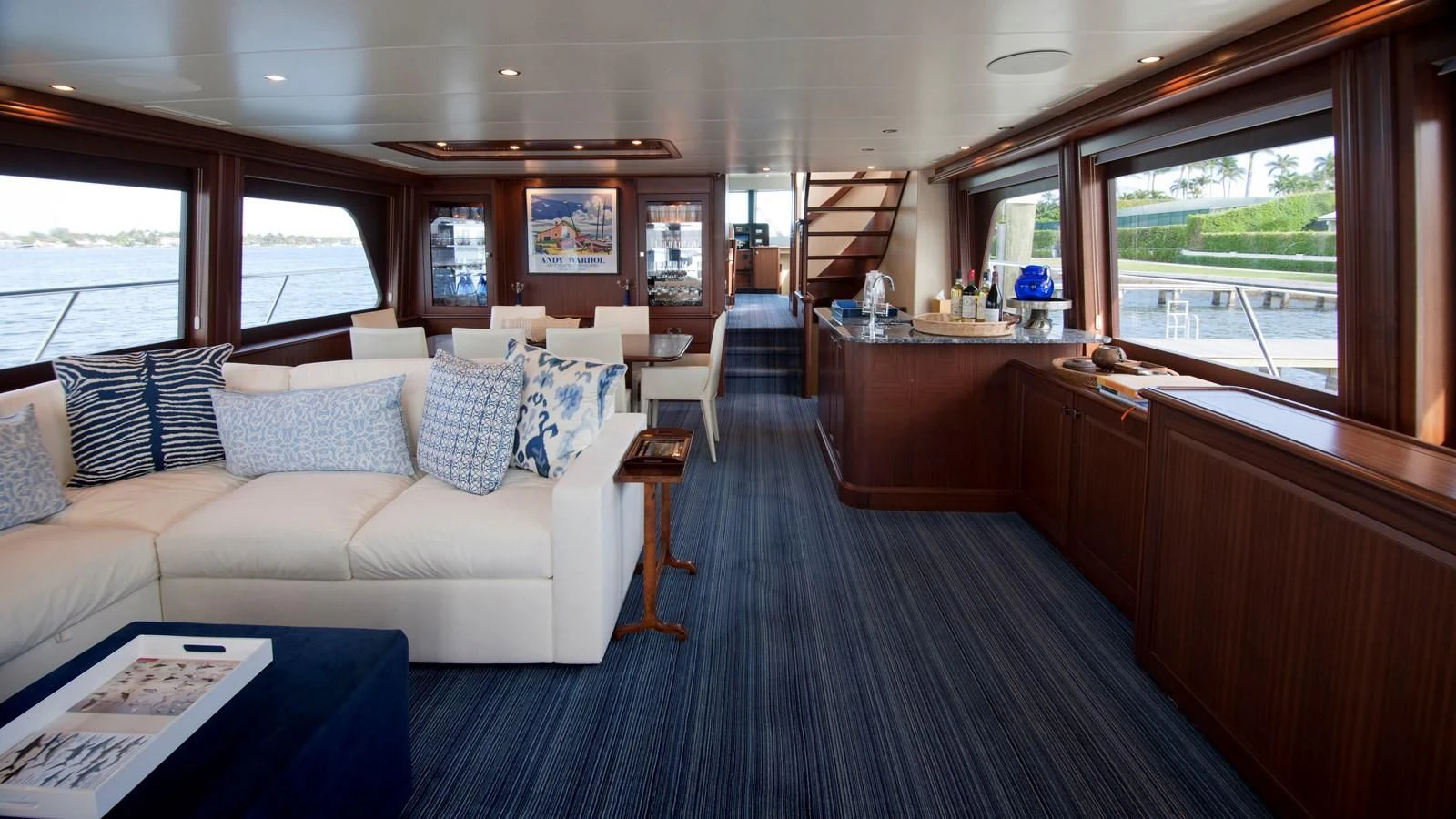 a large living room with a large window aboard MONCRII Yacht for Sale