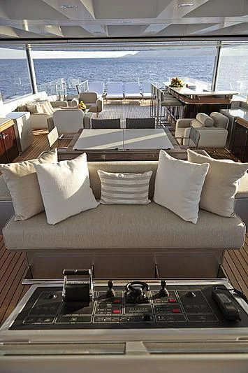 a living room with a large window aboard EXCELLENCE V Yacht for Sale