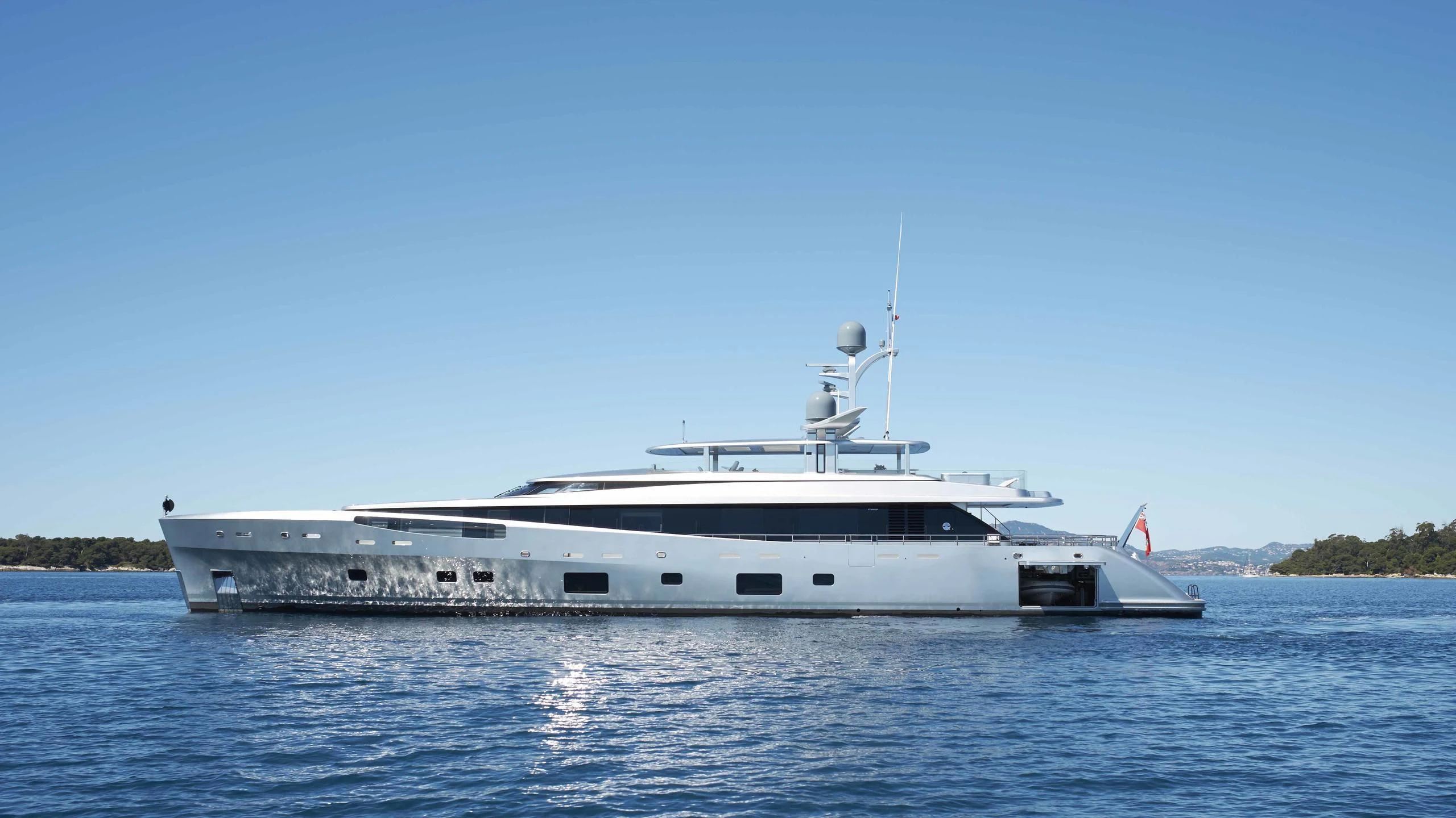 a large white boat on the water aboard EXCELLENCE V Yacht for Sale