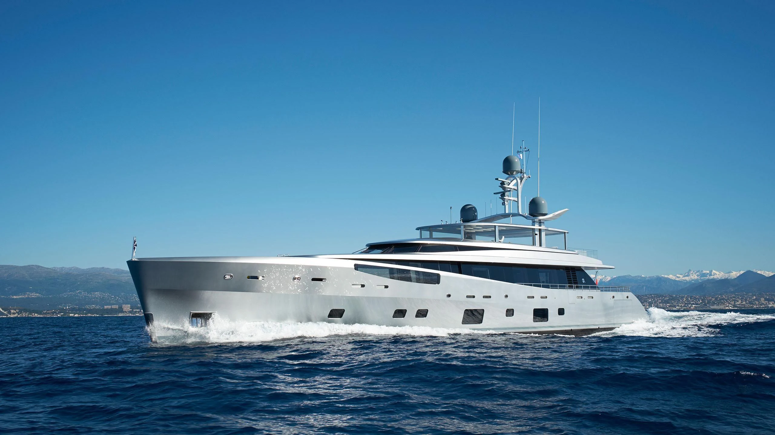 a white yacht in the water aboard EXCELLENCE V Yacht for Sale