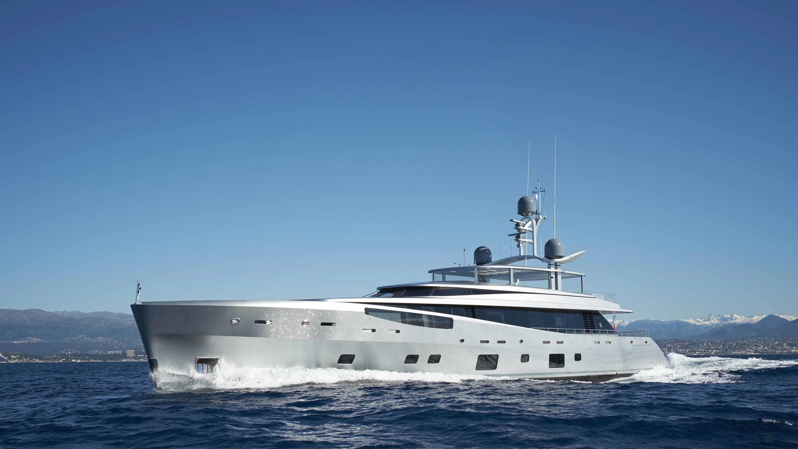 a white yacht in the water aboard EXCELLENCE V Yacht for Sale