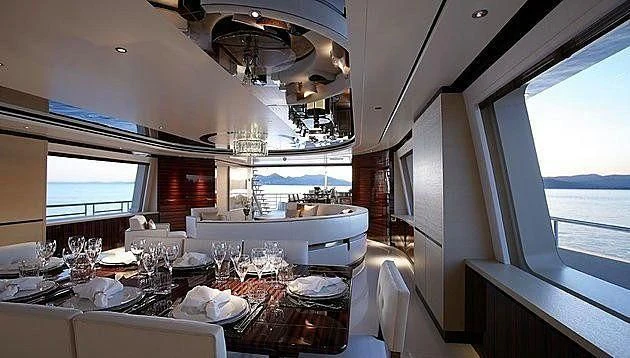 a dining table set for a dinner aboard EXCELLENCE V Yacht for Sale
