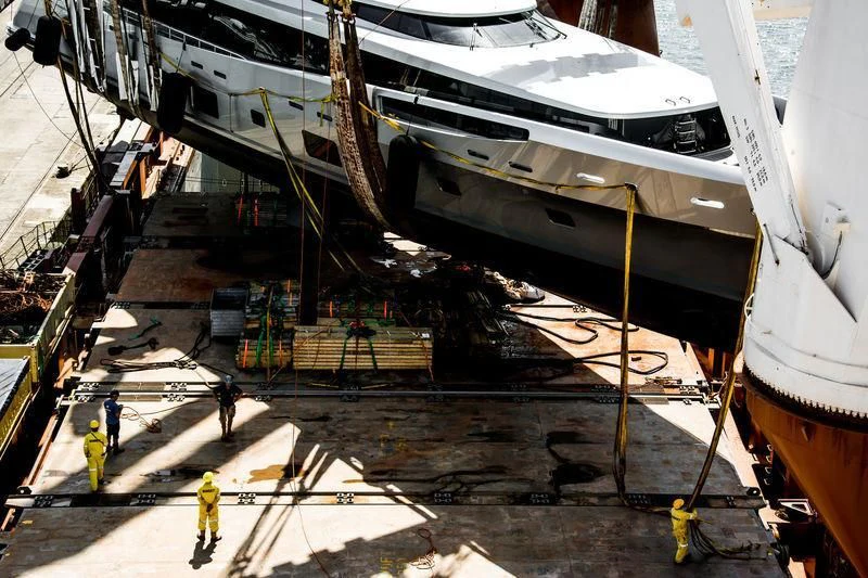 a plane being prepared for a flight aboard EXCELLENCE V Yacht for Sale