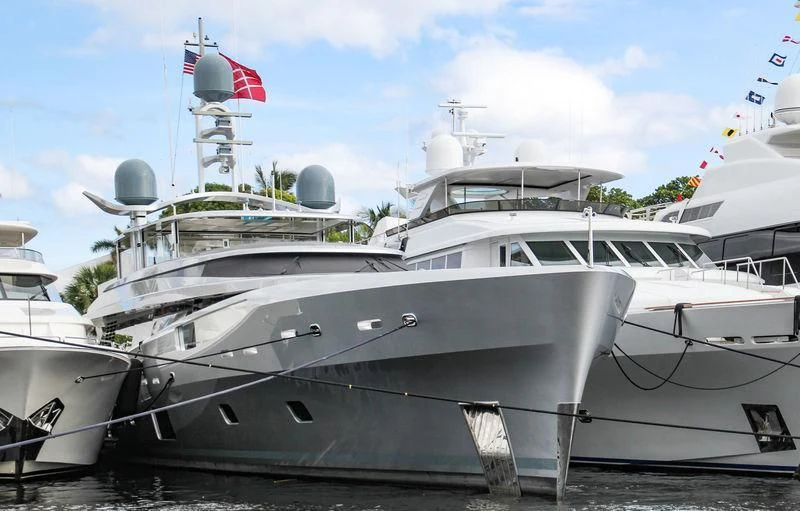 a group of boats in a harbor aboard EXCELLENCE V Yacht for Sale
