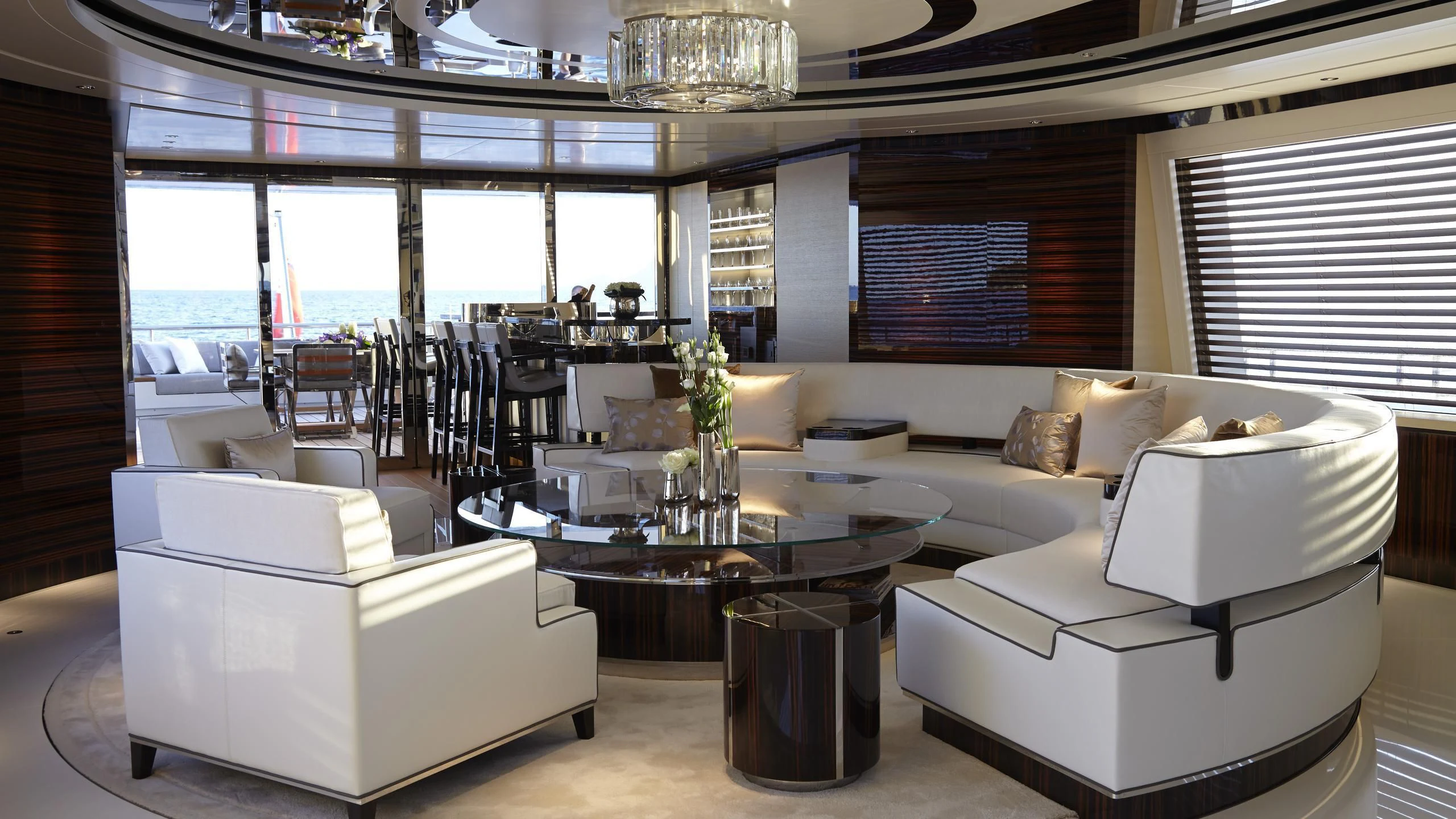 a living room with a large window aboard EXCELLENCE V Yacht for Sale