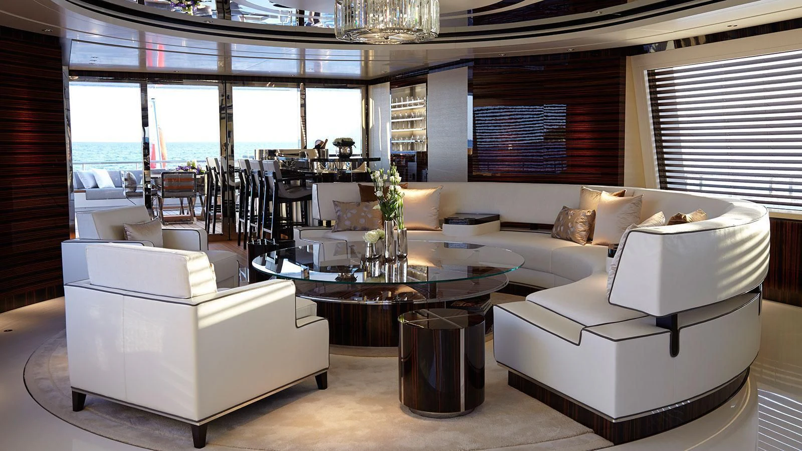 a living room with a large window aboard EXCELLENCE V Yacht for Sale
