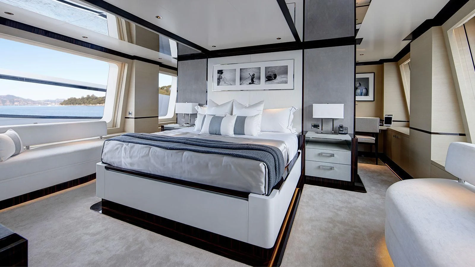 a large bed in a room aboard EXCELLENCE V Yacht for Sale