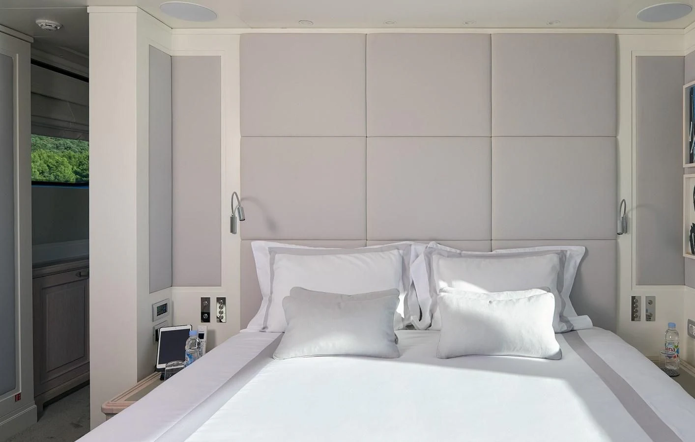 a white bed with white sheets aboard 2011 SANLORENZO SD92 FLYBRIDGE Yacht for Sale