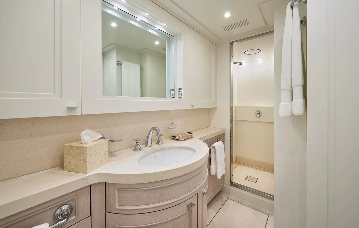 a bathroom with a sink and a mirror aboard 2011 SANLORENZO SD92 FLYBRIDGE Yacht for Sale