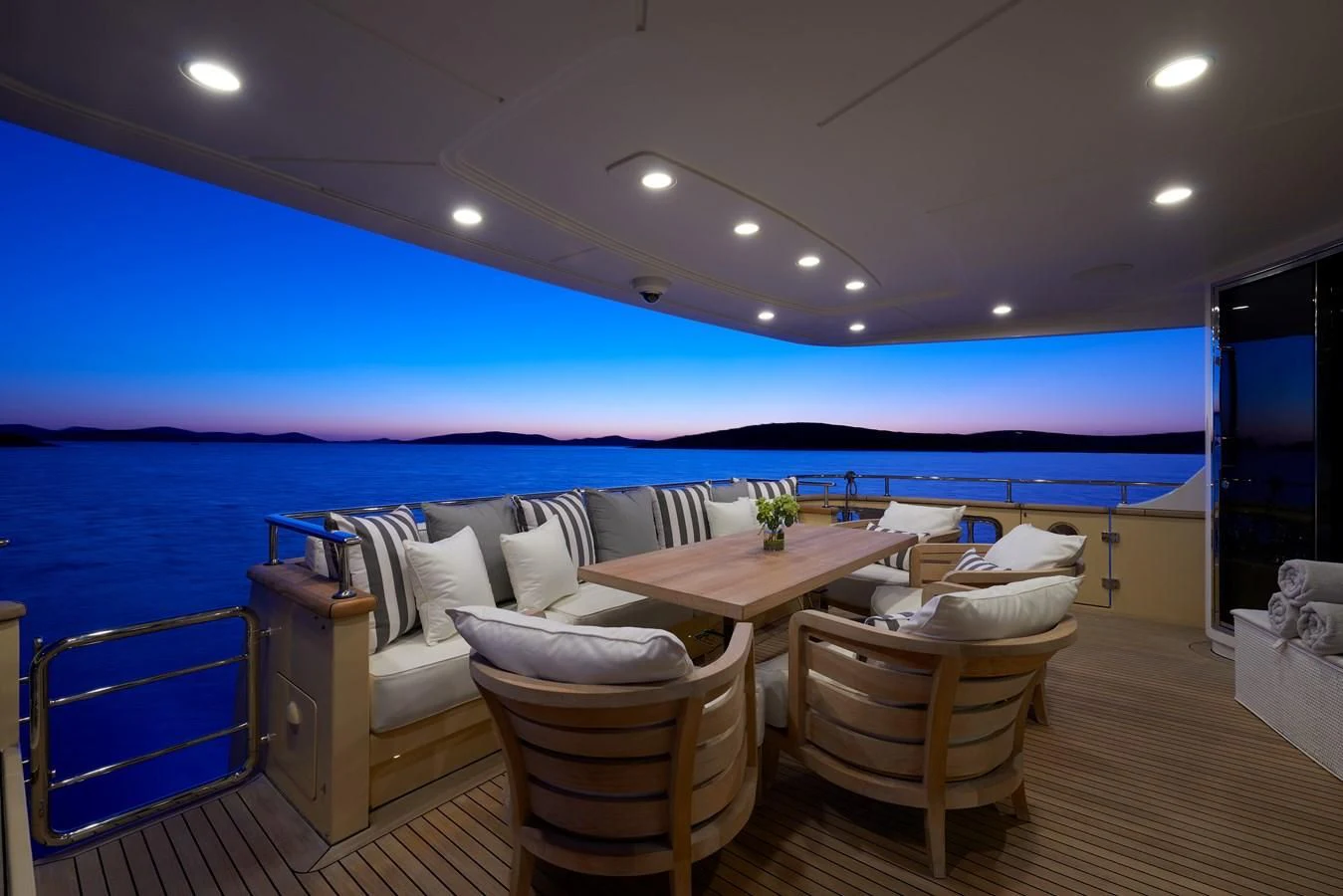 a large swimming pool with a couch and chairs aboard 2011 SANLORENZO SD92 FLYBRIDGE Yacht for Sale