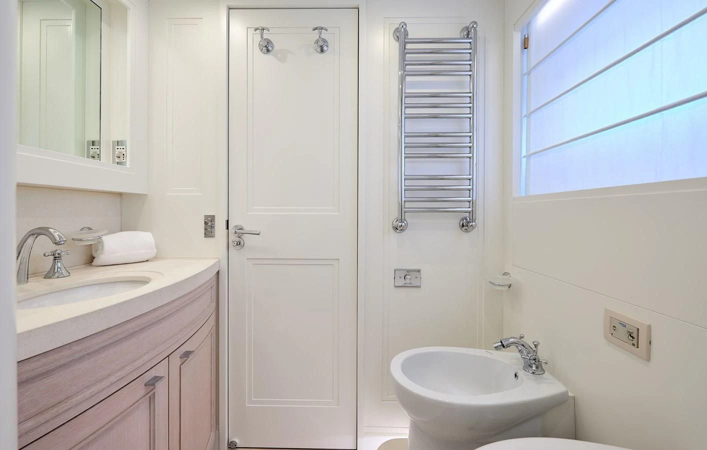 a bathroom with a sink and a shower unit aboard 2011 SANLORENZO SD92 FLYBRIDGE Yacht for Sale