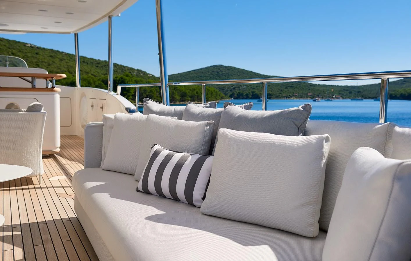 a couch on a deck aboard 2011 SANLORENZO SD92 FLYBRIDGE Yacht for Sale