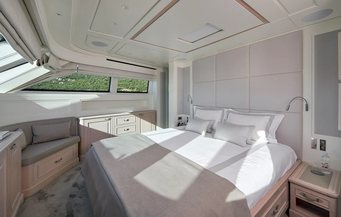 a bedroom with a bed and a couch aboard 2011 SANLORENZO SD92 FLYBRIDGE Yacht for Sale