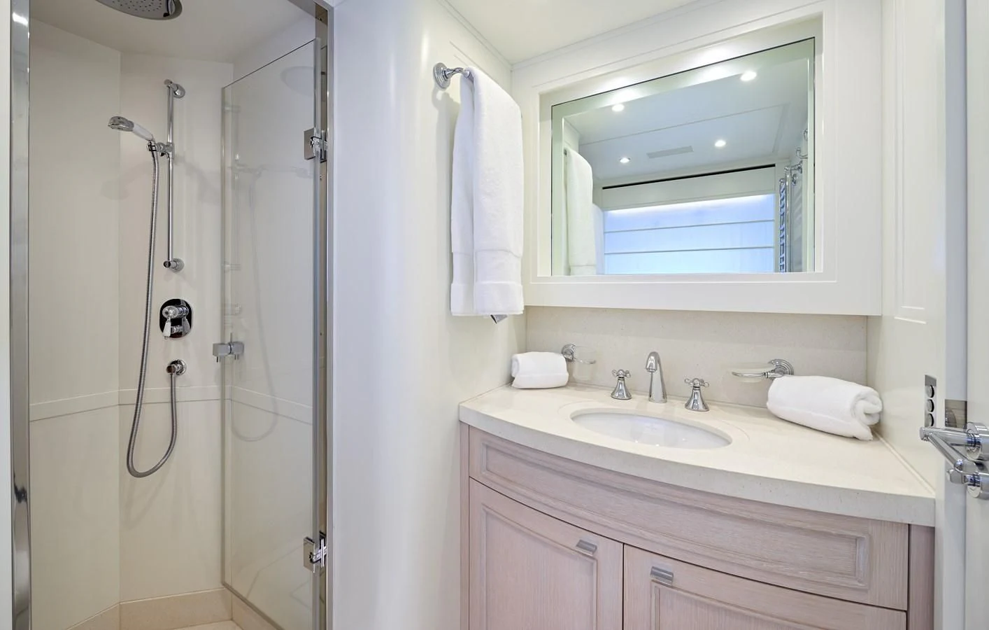 a bathroom with a sink and a shower unit aboard 2011 SANLORENZO SD92 FLYBRIDGE Yacht for Sale