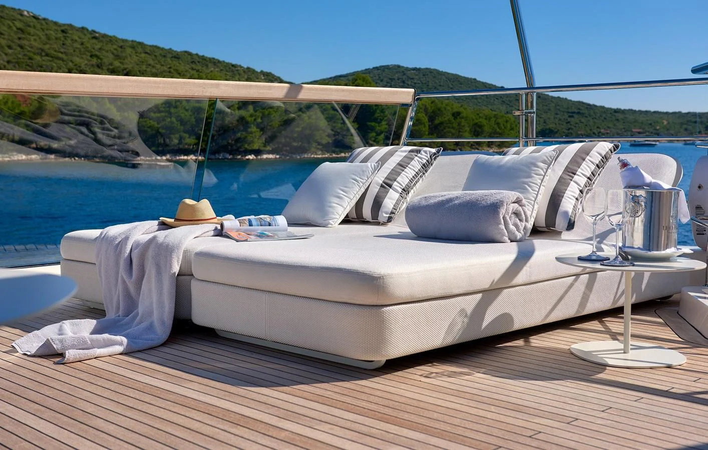 a bed on a deck aboard 2011 SANLORENZO SD92 FLYBRIDGE Yacht for Sale