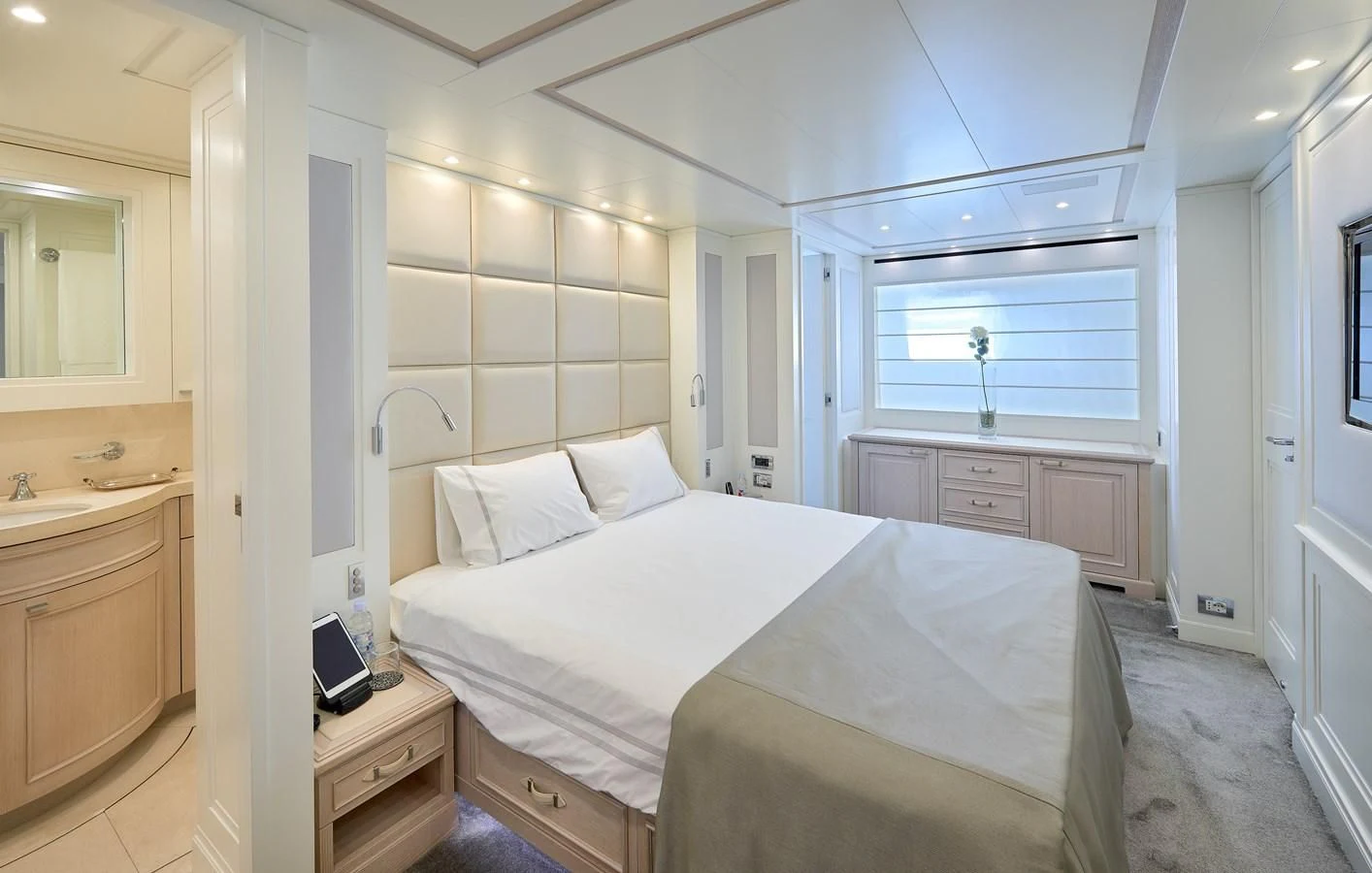 a bedroom with a bed and a sink aboard 2011 SANLORENZO SD92 FLYBRIDGE Yacht for Sale
