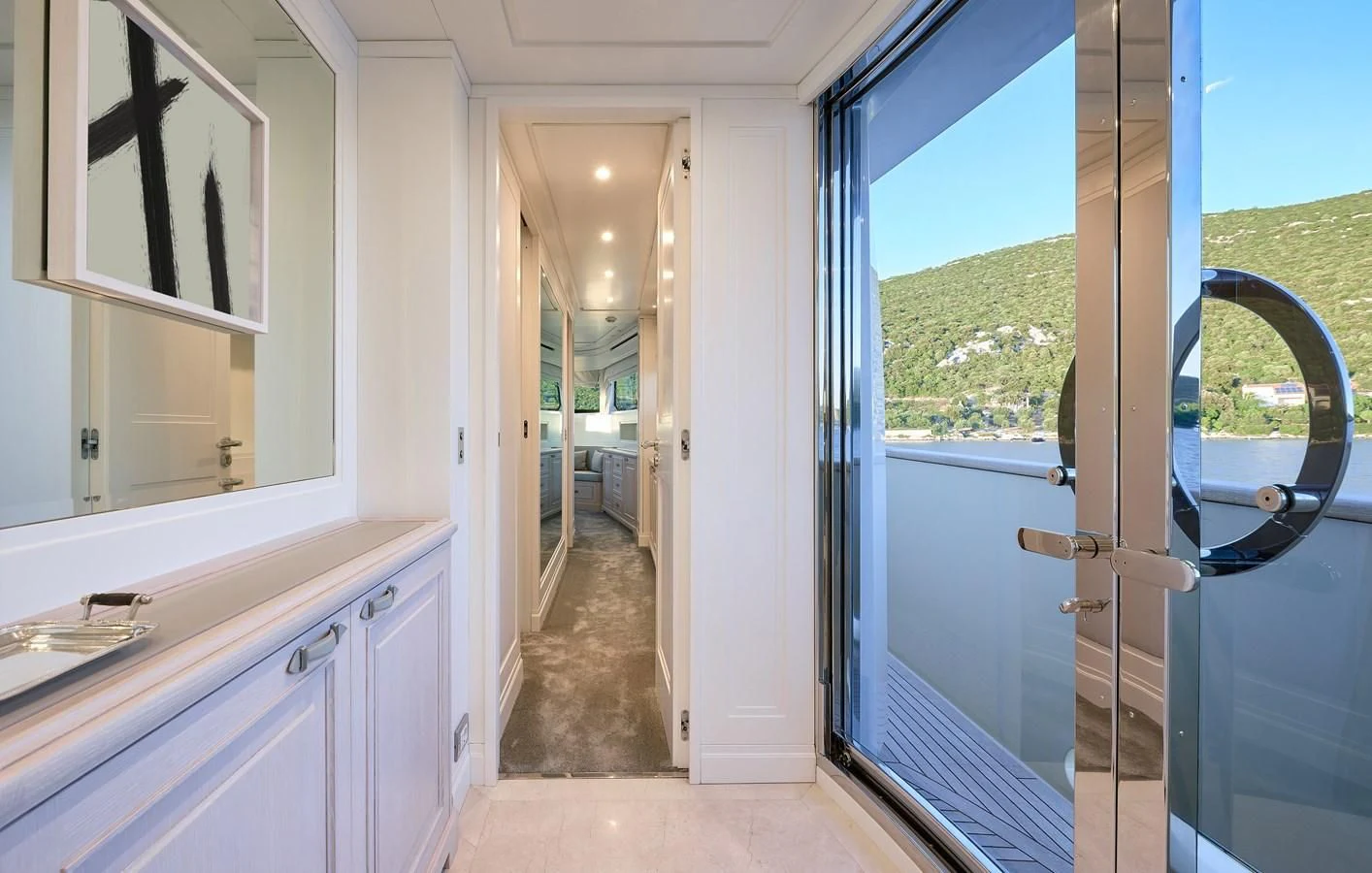 a bathroom with a large glass shower aboard 2011 SANLORENZO SD92 FLYBRIDGE Yacht for Sale