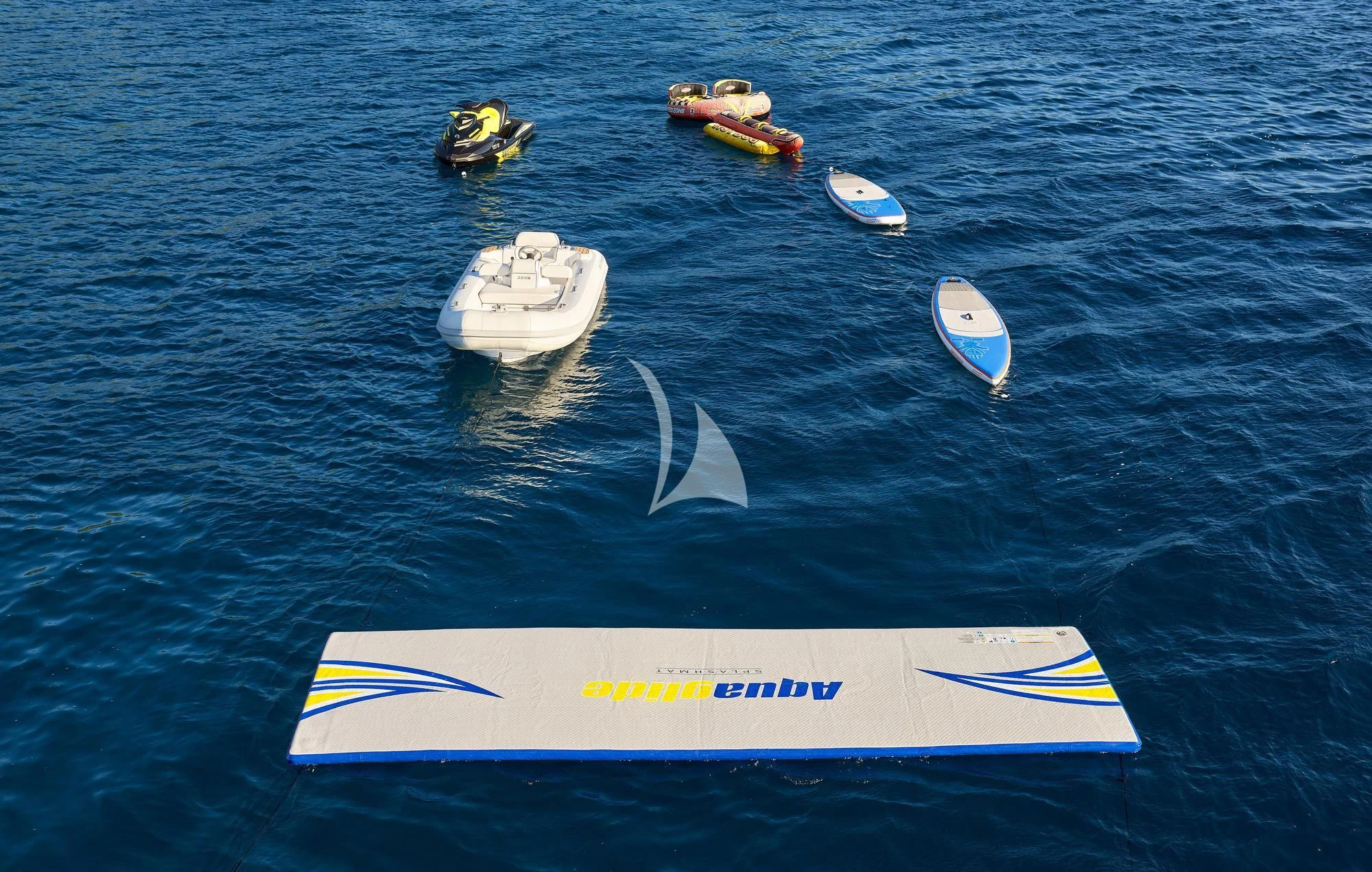 a surfboard in the water aboard 2011 SANLORENZO SD92 FLYBRIDGE Yacht for Sale