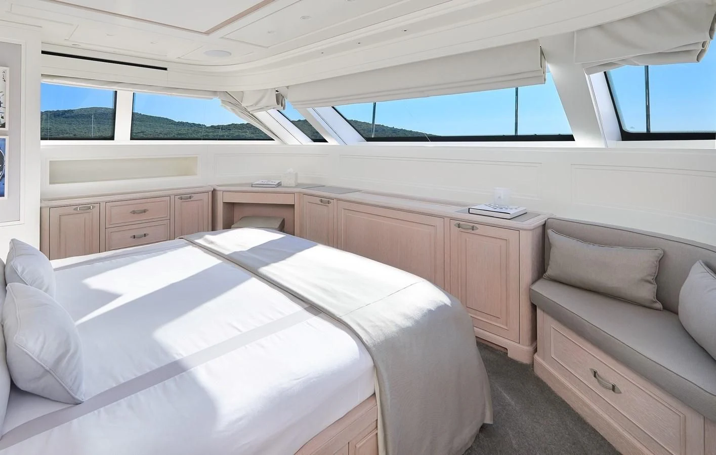a room with a bed and a couch aboard 2011 SANLORENZO SD92 FLYBRIDGE Yacht for Sale