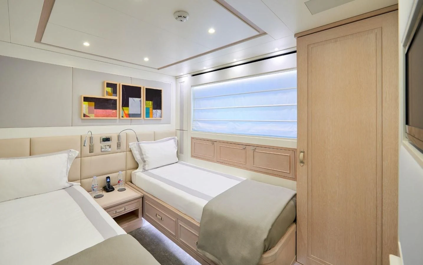 a room with two beds aboard 2011 SANLORENZO SD92 FLYBRIDGE Yacht for Sale