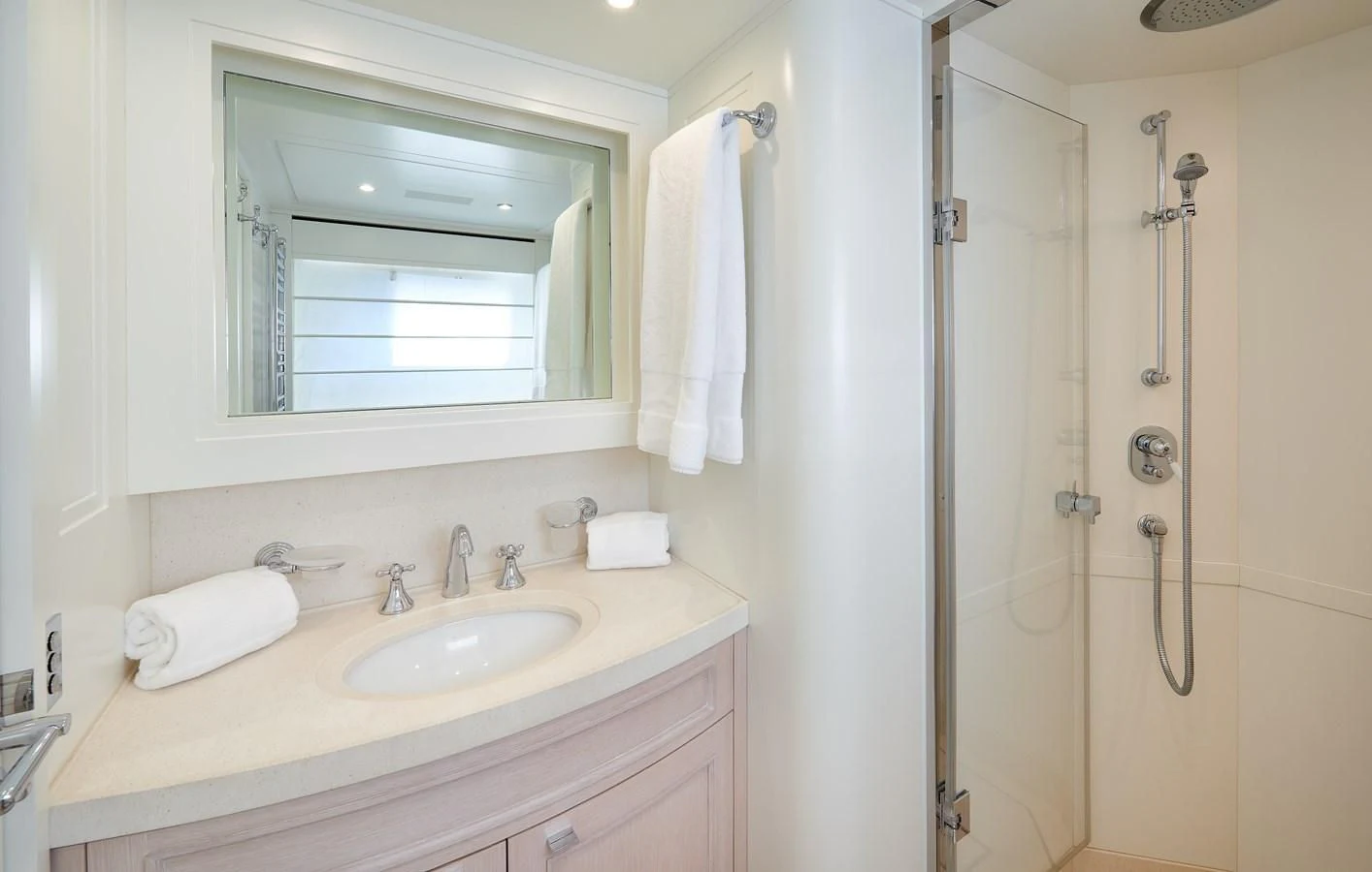 a bathroom with a sink and a shower unit aboard 2011 SANLORENZO SD92 FLYBRIDGE Yacht for Sale