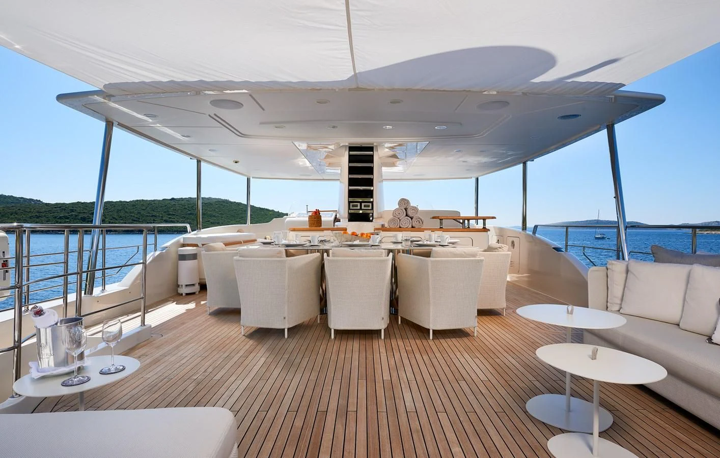 a large living room with a large open roof aboard 2011 SANLORENZO SD92 FLYBRIDGE Yacht for Sale
