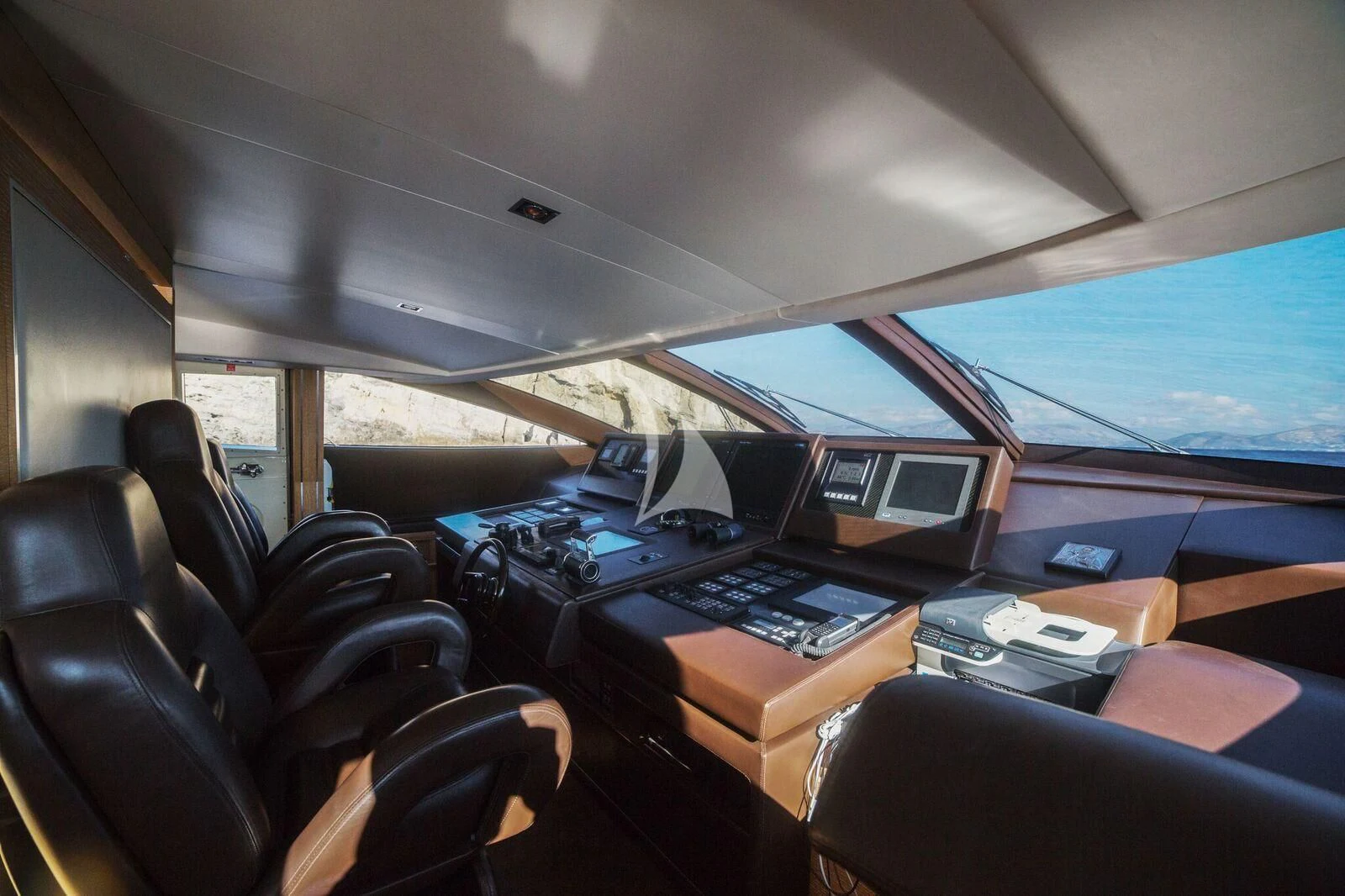 inside of a vehicle with many seats and computers aboard ELEVEN I Yacht for Sale