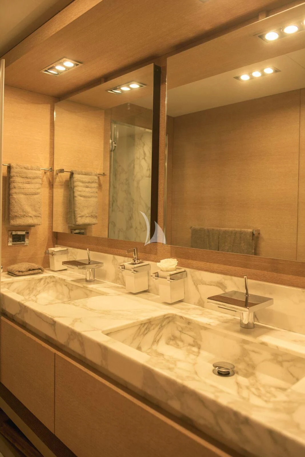 a bathroom with a large mirror aboard ELEVEN I Yacht for Sale