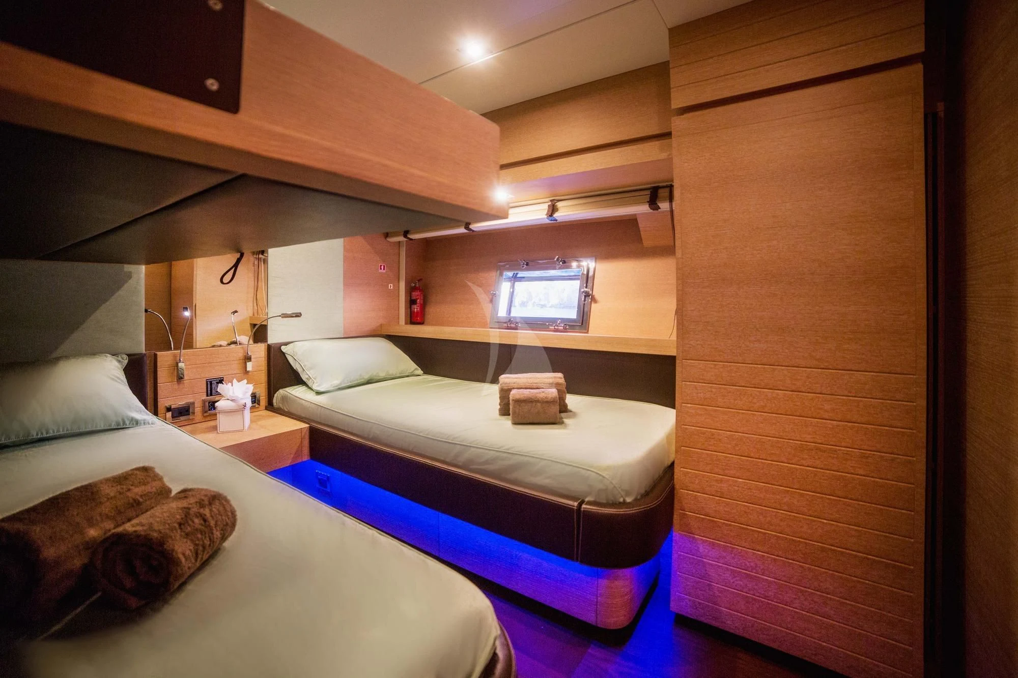 a room with two beds aboard ELEVEN I Yacht for Sale