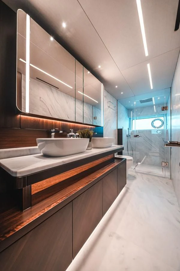 a bathroom with a large mirror aboard 88 YACHT Yacht for Sale
