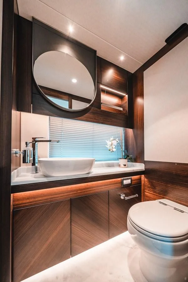 a bathroom with a large mirror aboard 88 YACHT Yacht for Sale
