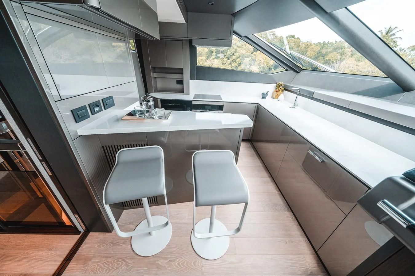 a room with a table and chairs aboard 88 YACHT Yacht for Sale