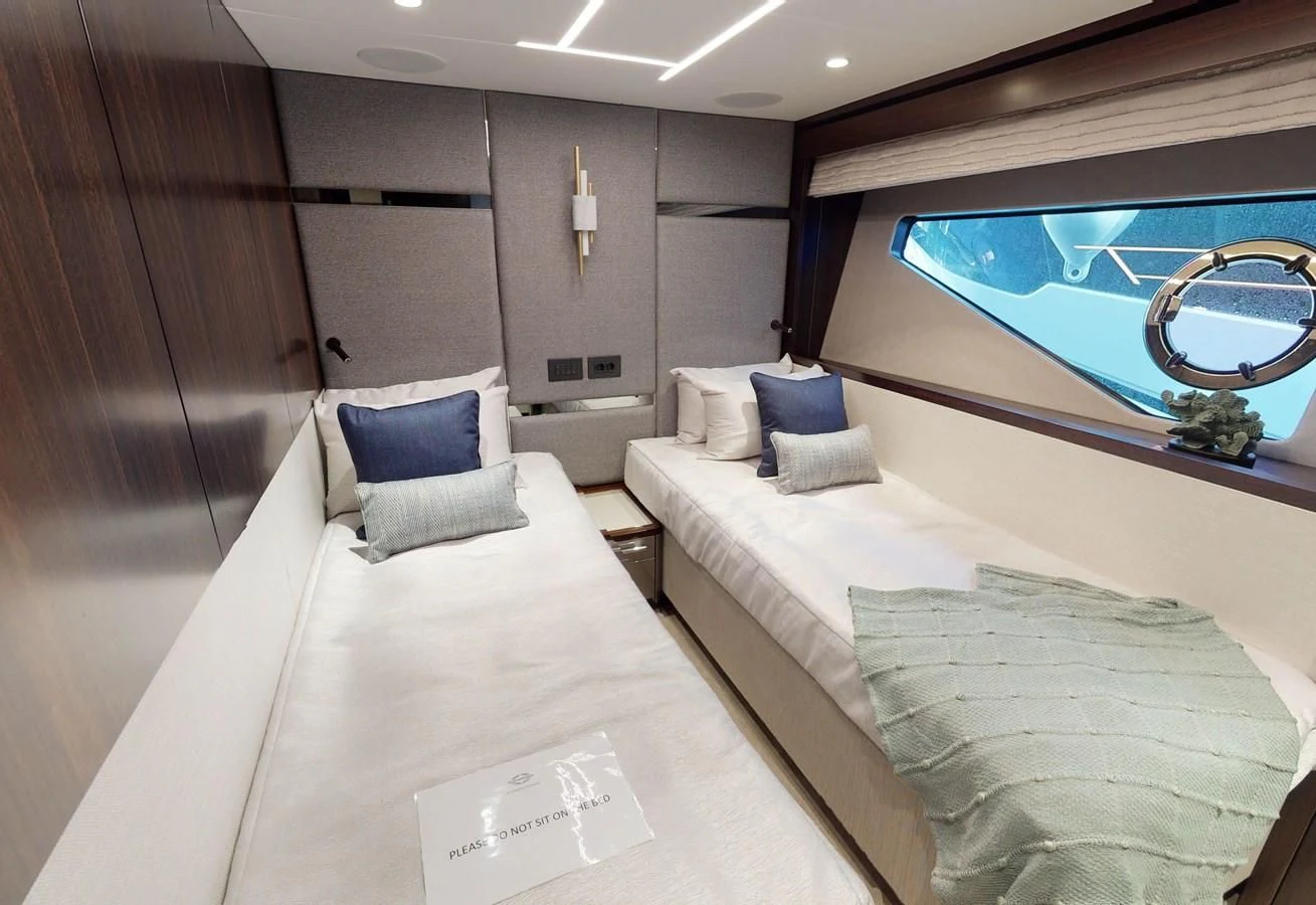 a room with a bed and a mirror aboard 88 YACHT Yacht for Sale