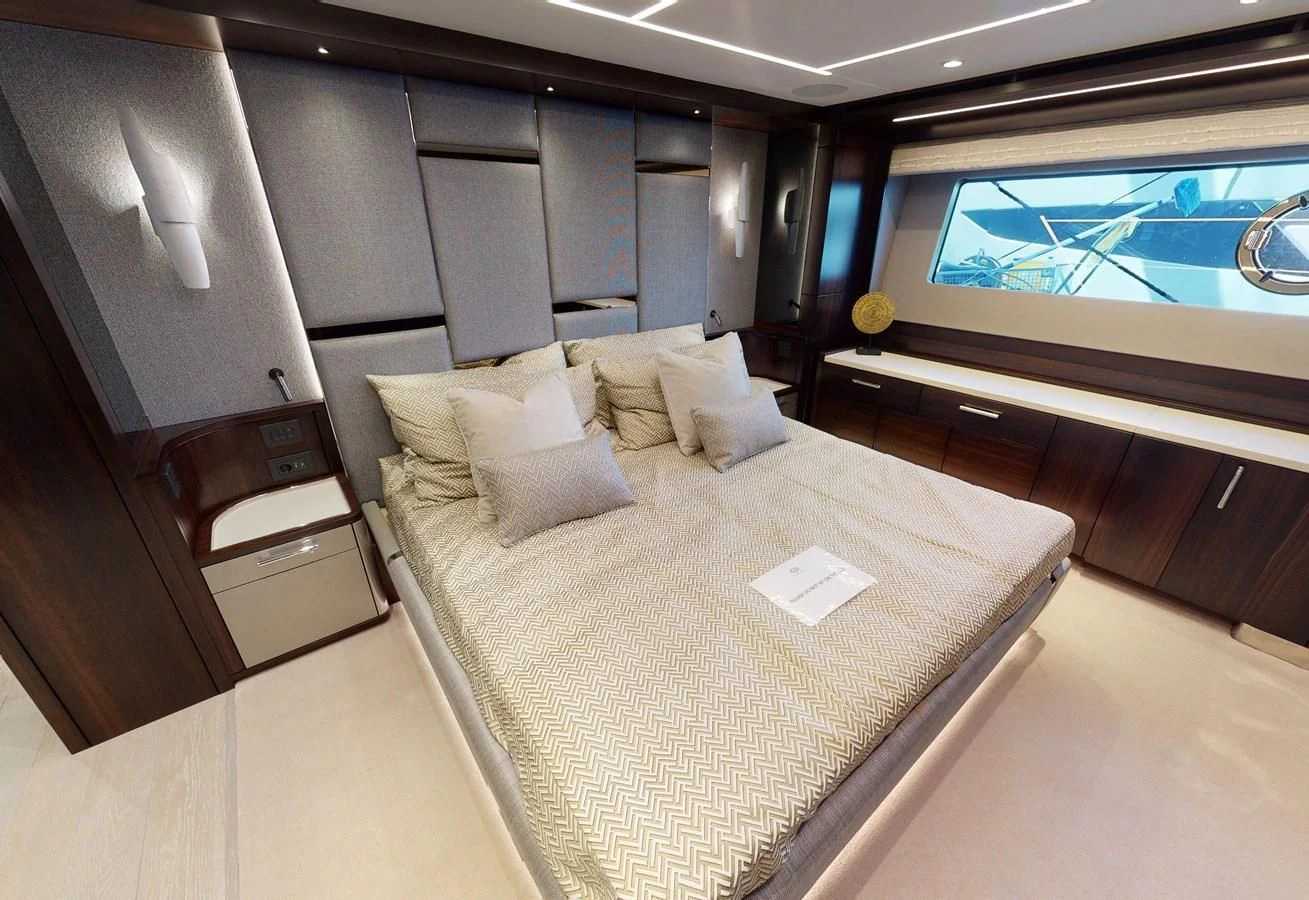 a room with a bed and a large window aboard 88 YACHT Yacht for Sale