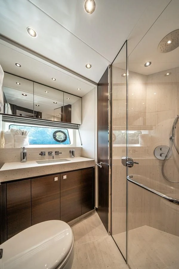 a bathroom with a glass shower aboard 88 YACHT Yacht for Sale